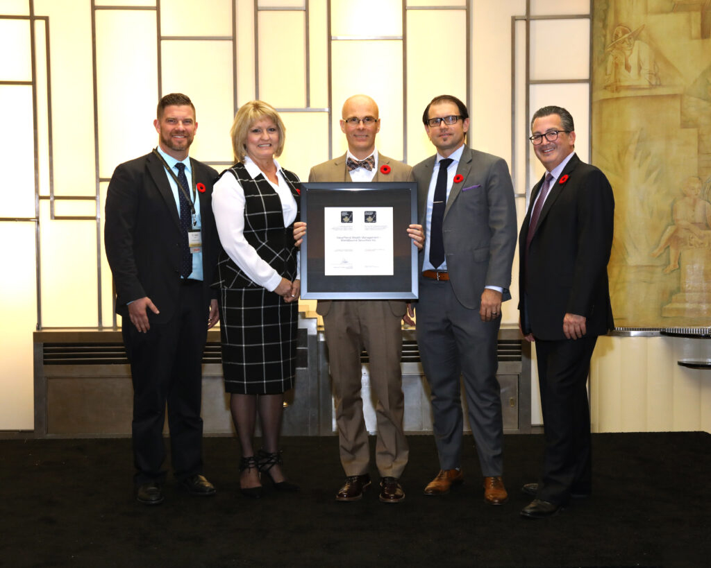 The ValueTrend Wealth Management team shown receiving the 2017 Canadian Business Excellence Award